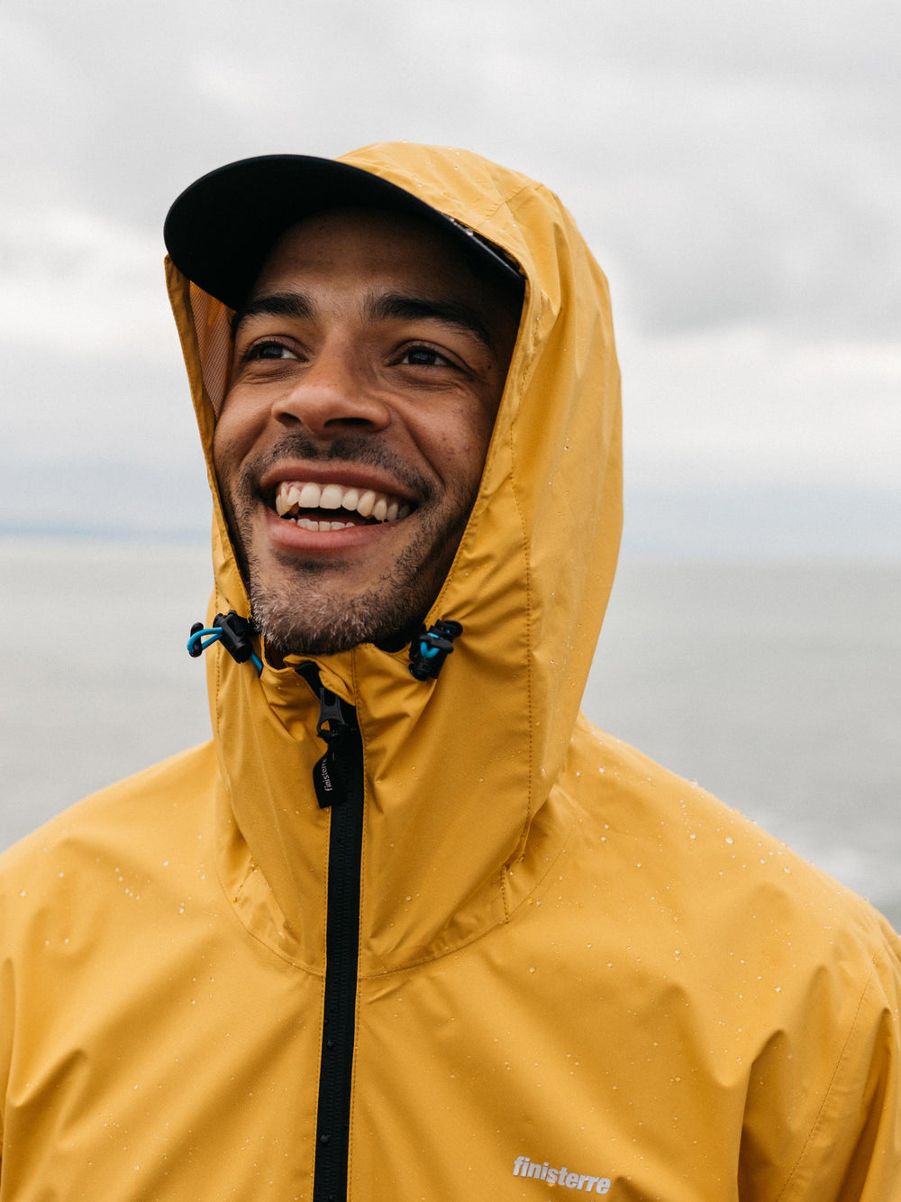 Recycled Waterproof Jacket in Orange - Rainbird